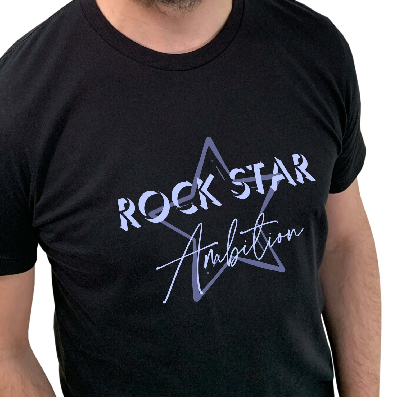 Man wearing mens black short sleeve graphic tshirt. Crew neck casual wear. Band Tee Design is mid purple star outline behind wording ROCK STAR in upper case shadowed light grey/purple text, then Ambition below in script. Rock music themed unisex top