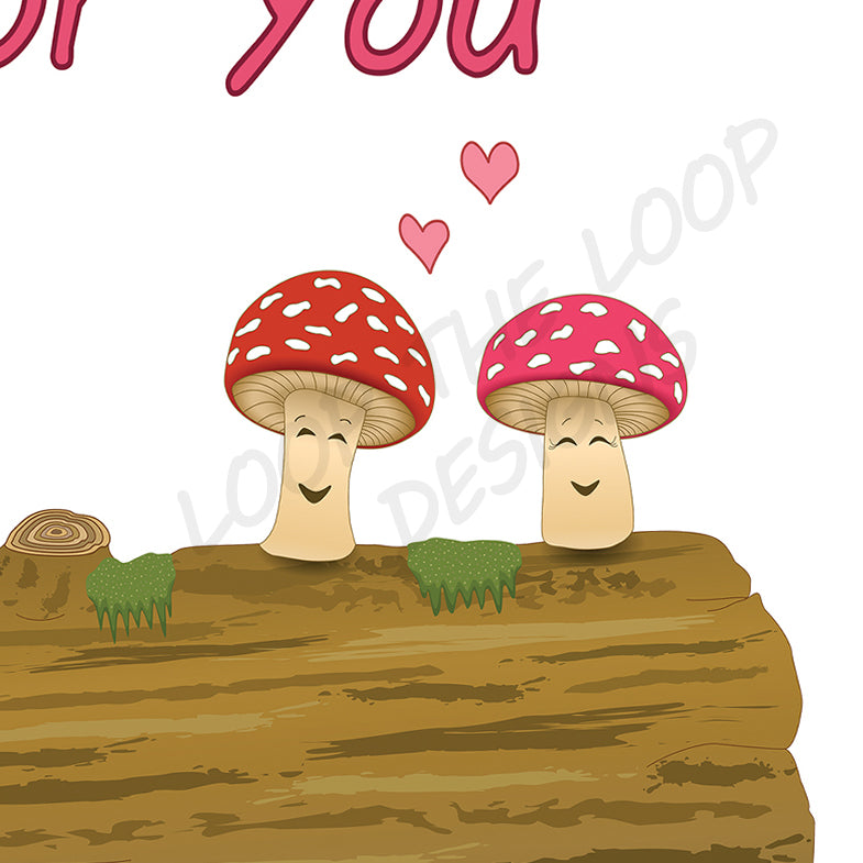 Close up of Cute Mushroom / Toadstool woodland theme Greetings card for 5 year wood anniversary or valentines. White card of 2 toadstool mushrooms on top of wooden log smiling together with two hearts floating just above them.