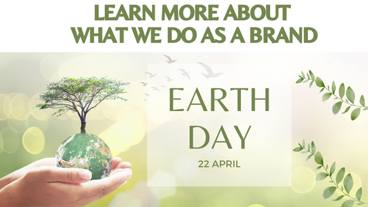 Hands holding  small  earth  with  tree growing out the to.  Earth Day actioms for the brand Learn More p 