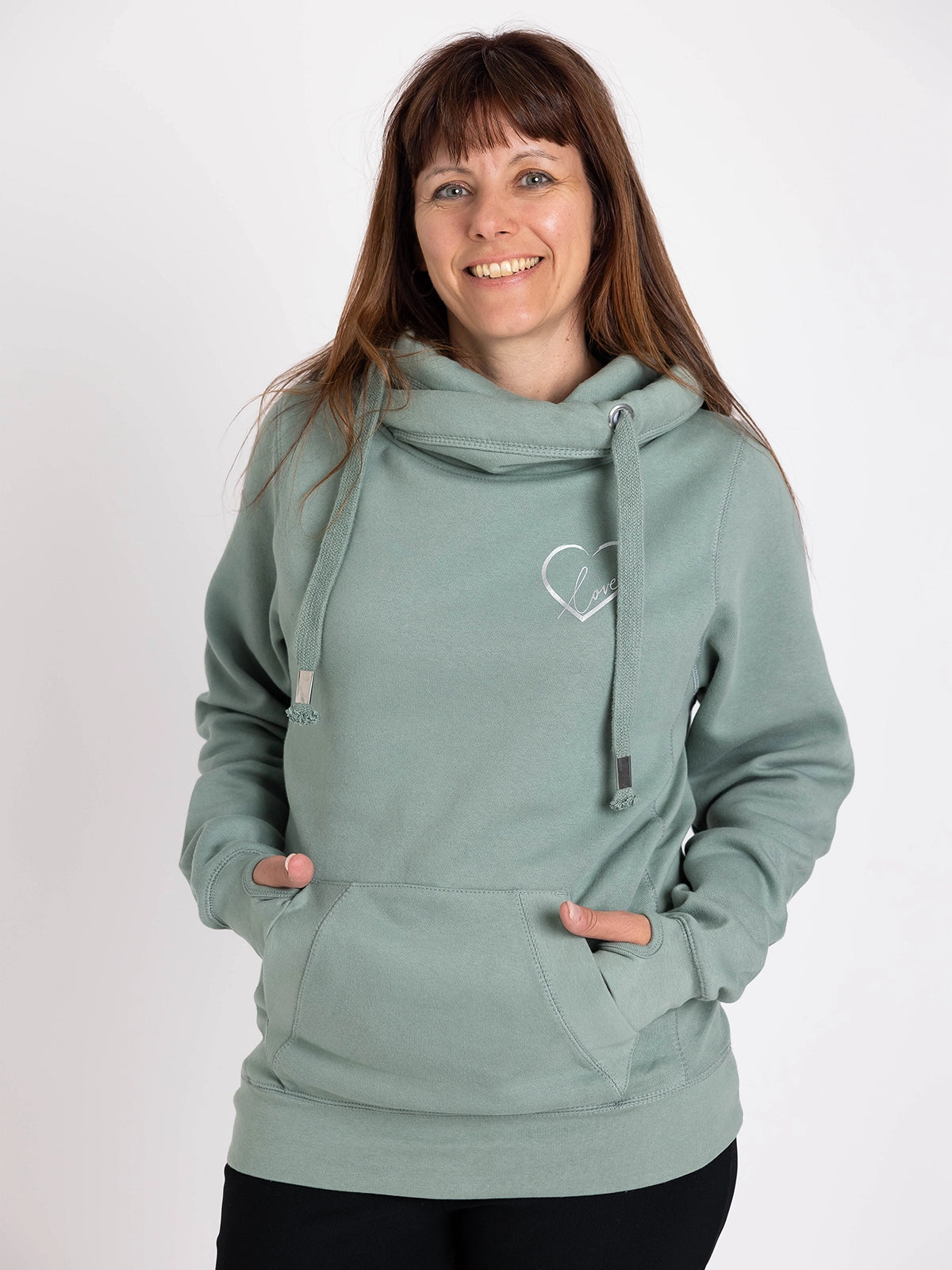 Womens Cowl Neck Hoodie - Dusty sage green hoodie with silver metallic love heart motif. Long sleeves and thumb loops to cuffs. Front kangaroo pouch pocket. Cross neck sweatshirt with hood