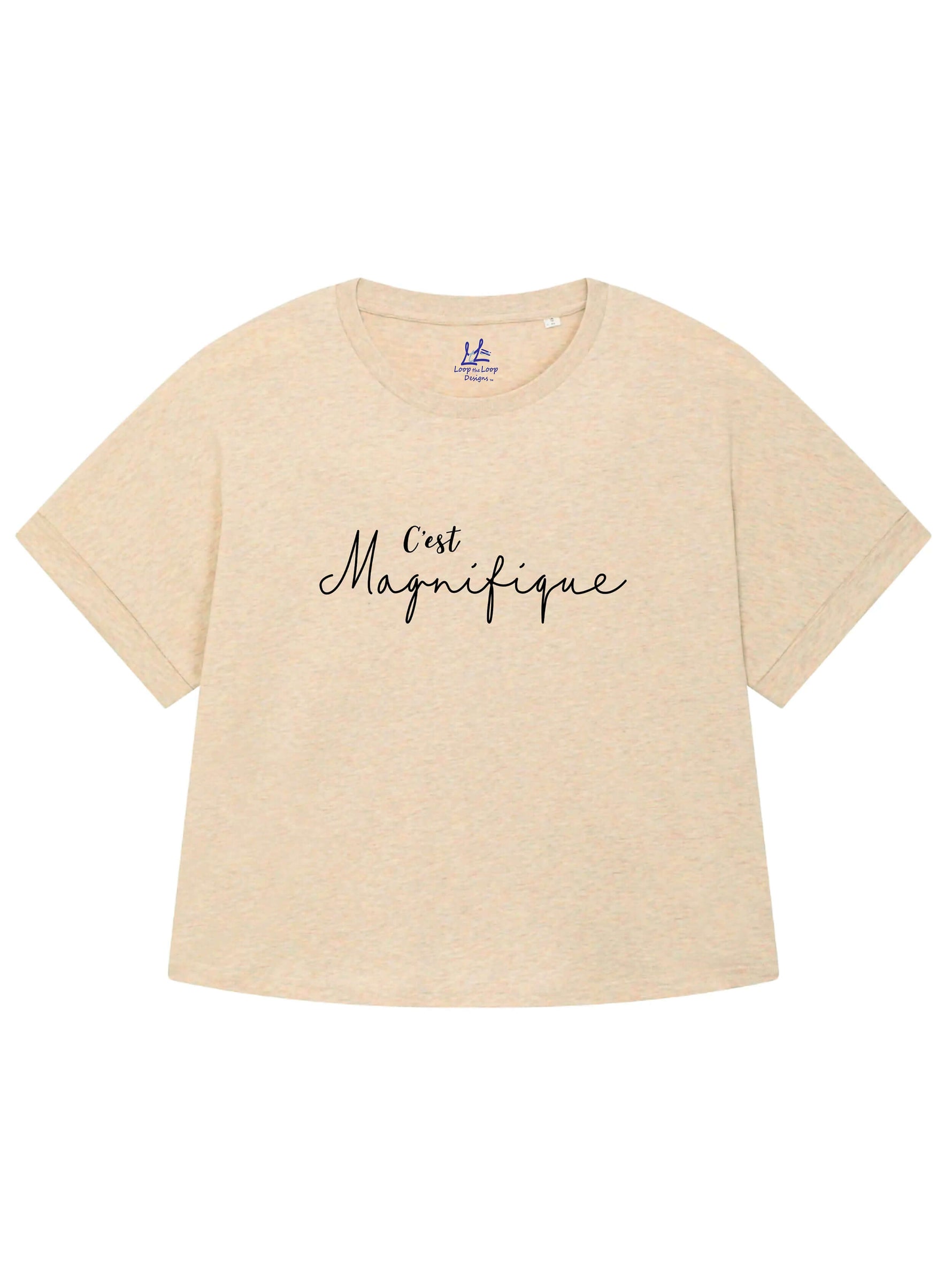 Rainbow heather beige/cream ladies T-Shirt with dolman sleeve, rib neck collar and sleeve cuff fold. Rainbow Heather - light beige/cream base colour with multicolour flecks. Oversized women’s t-shirt with a short sleeves, inspired by the 1990s oversize trend.. Black slogan script font design reads French phrase C'est Magnifique