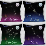 4 variations shown of personalised astrological star sign 18 inch home decor cushion. Top Left is black with pinky purple hue, Top R with blue hue, Bottom Left emerald green hue and bottom right deep purple hue. 3 show small owl variation. Other show rocket ship variation. All personalised. Top left of each cushion shows zodiac sign of the star constellation. Top right of the cushion has a cute smiling moon with 2 gold colour stars. 2 personalised with boys name, 2 with girls name 