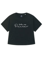 Black womens oversized T-shirt with loose sleeves with roll cuffs. The ladies tshirt has the french words Voulez Vous Danser in white