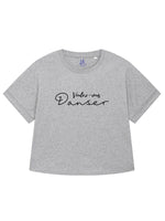 Light grey womens oversized T-shirt with loose sleeves with roll cuffs. The ladies tshirt has the french words Voulez Vous Danser in black