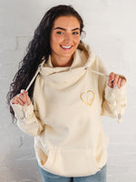 Womens Cowl Neck Hoodie - Cotton Vanilla cream hoodie with gold metallic love heart motif. Long sleeves and thumb loops to cuffs. Front kangaroo pouch pocket. Cross neck sweatshirt with hood with silver metal eyelets for thick fabric drawstrings and silver metallic toggle. Cosy casual wear autumn / winter ladies hoodie 
