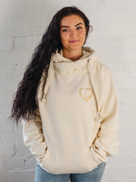 Womens Cowl Neck Hoodie - Cotton Vanilla cream hoodie with gold metallic love heart motif. Long sleeves and thumb loops to cuffs. Front kangaroo pouch pocket. Ladies sweatshirt with hood