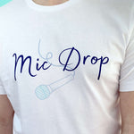 Mens white graphic t shirt with wording navy Mic Drop and blue microphone outline. Music theme unisex relaxed fit crew neck slogan tee