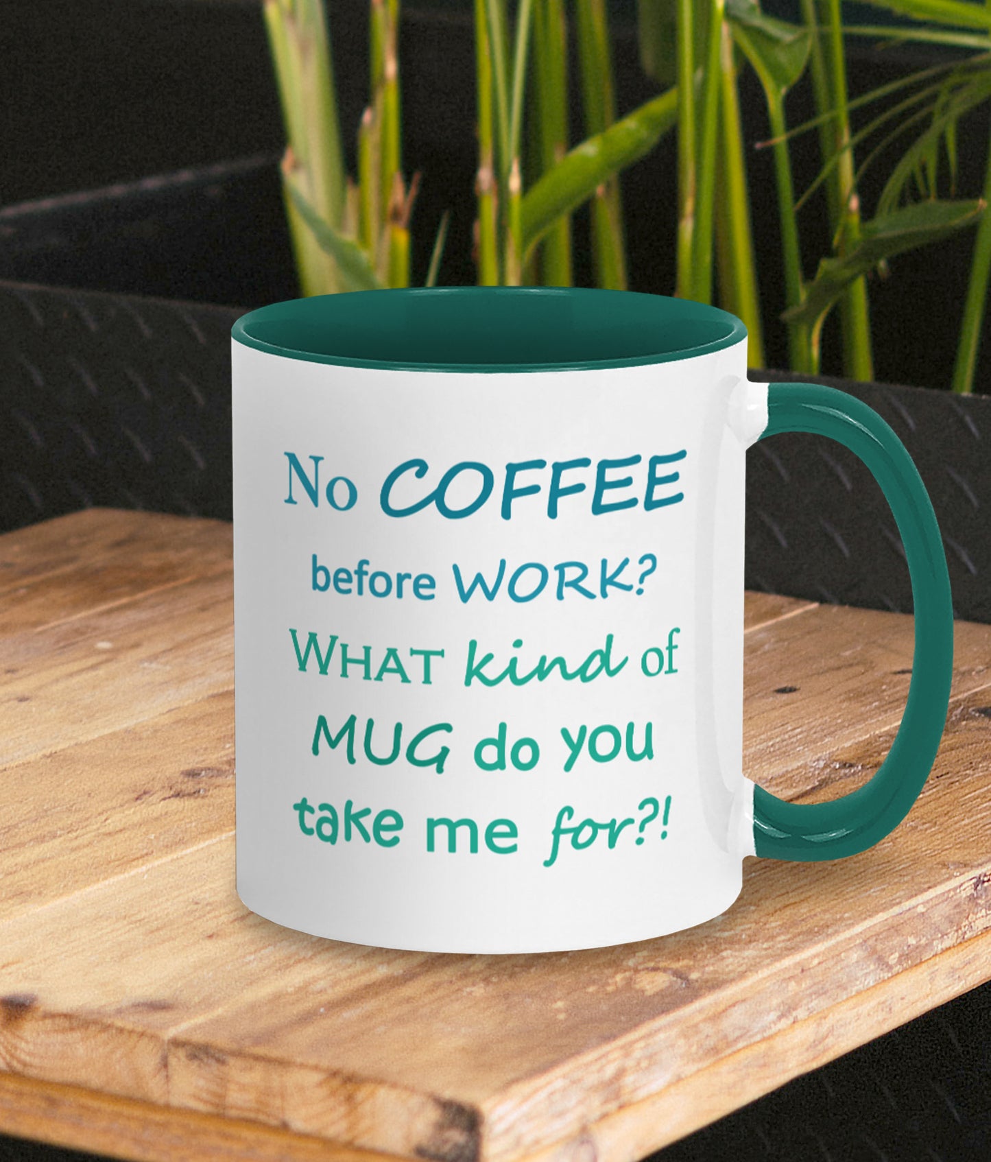 Amusing mug for the office to gift a work bestie. White mug with dark green inner and handle. Two tone green text on mug reads silly words No COFFEE before WORK? WHAT kind of MUG do you take me for?!